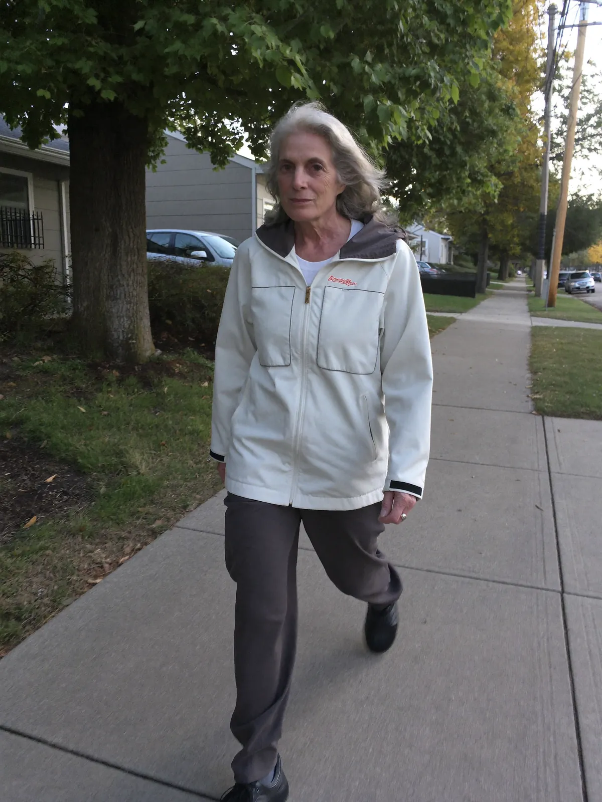 An active older woman gardening comfortably in her knee sleeves